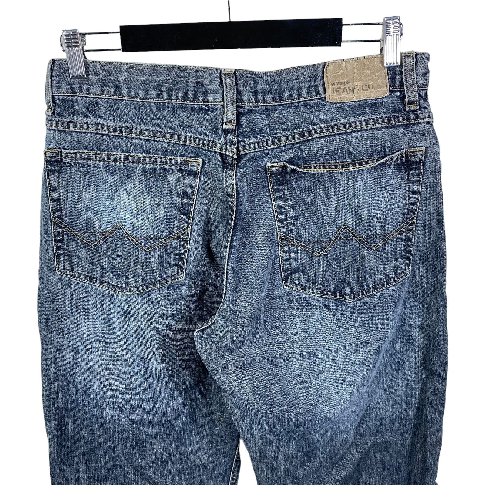 Collection of Wrangler Straight Leg Loose Dark Wash Denim Pants in a gallery layout