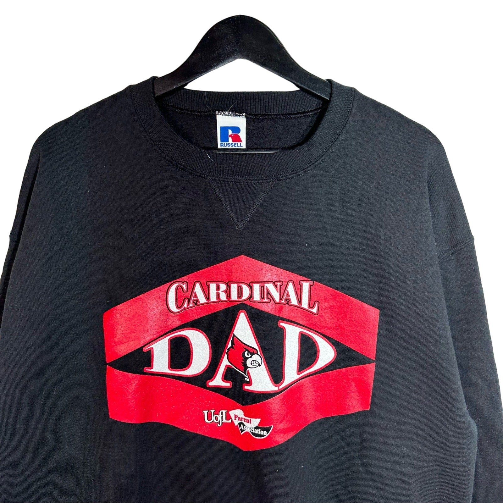 Collection of University of Louisville Cardinal “Dad” Parents Association Russell Athletic Crewneck Sweatshirt in a gallery layout