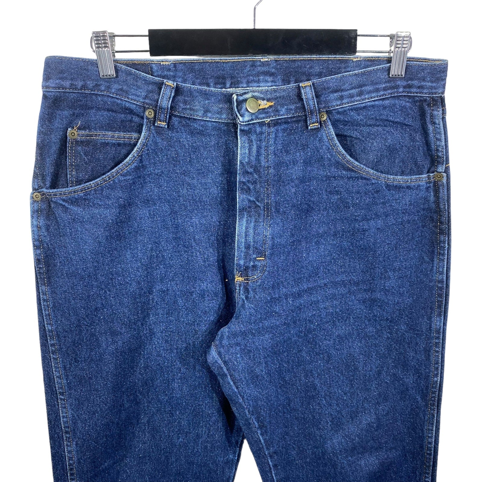 Collection of Wrangler Denim Straight Leg Jeans 34x32 in a gallery layout