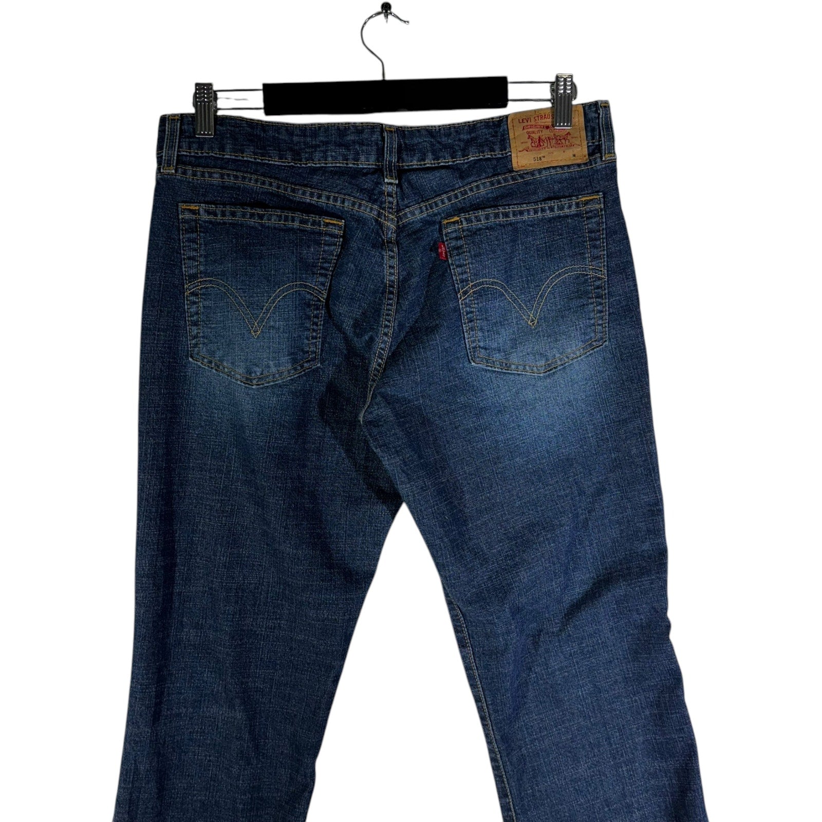 Collection of Levi Strauss Denim Flared Jeans 34x30.5 in a gallery layout