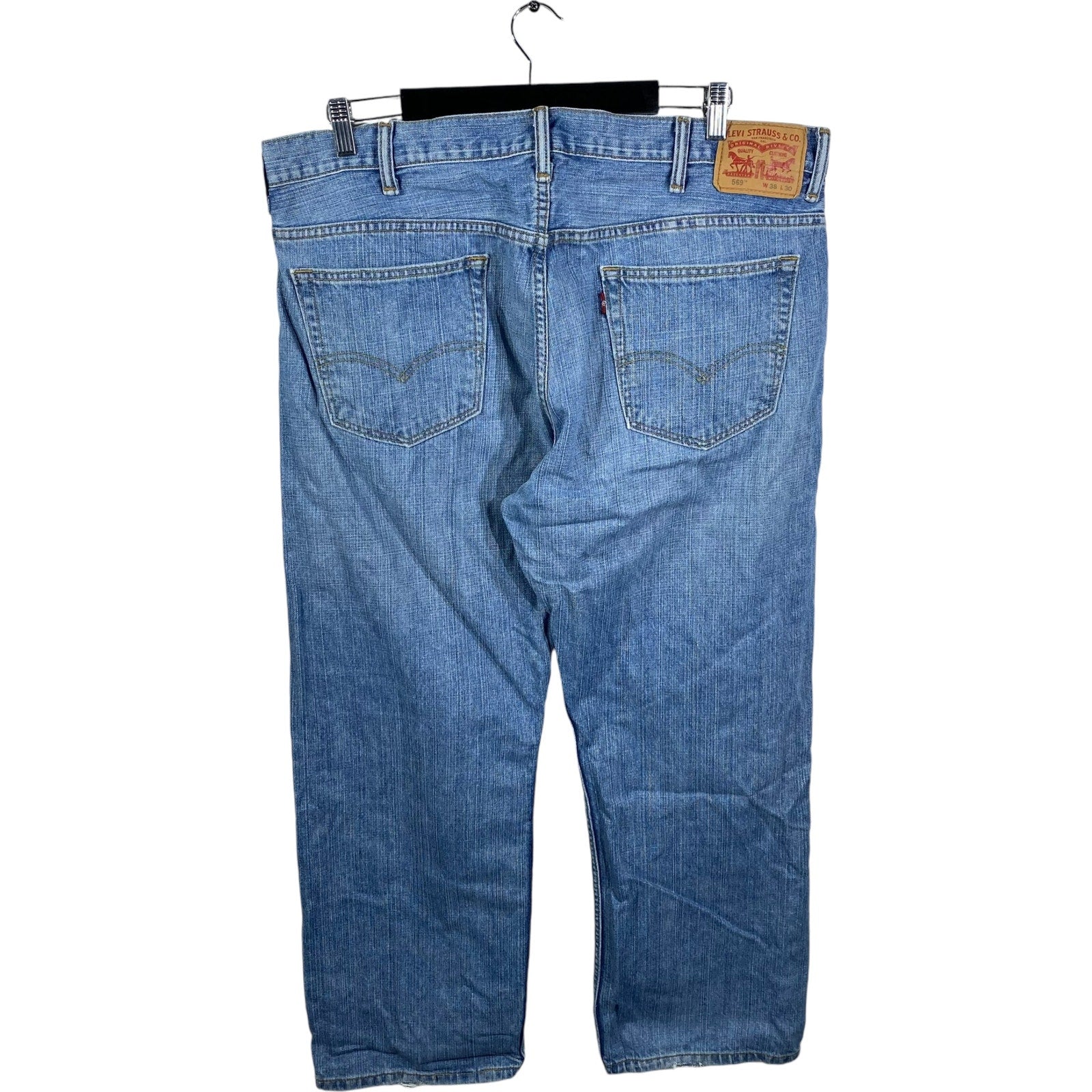 Collection of Levi's 569 Denim Straight Leg Jeans 38x30 in a gallery layout