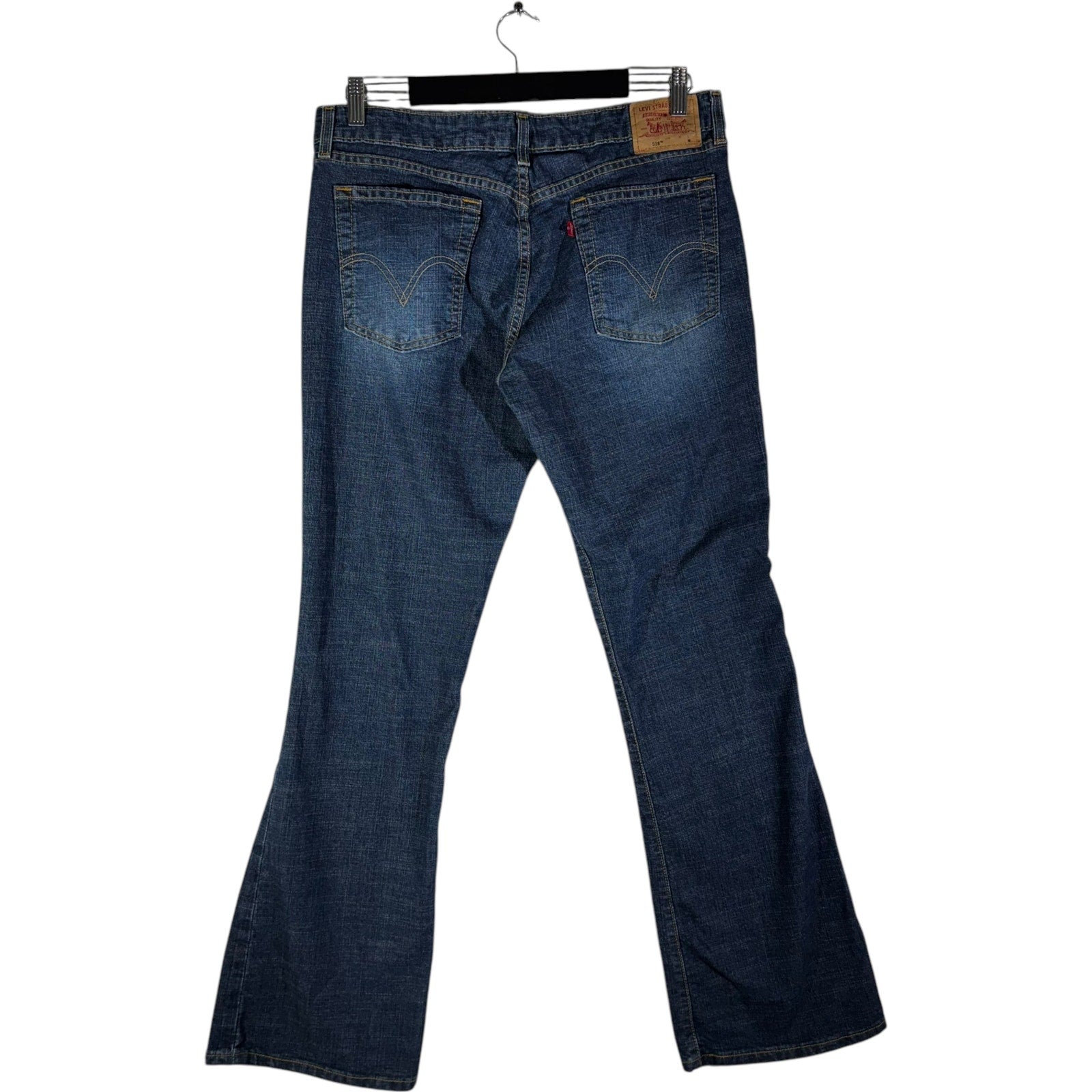 Collection of Levi Strauss Denim Flared Jeans 34x30.5 in a gallery layout