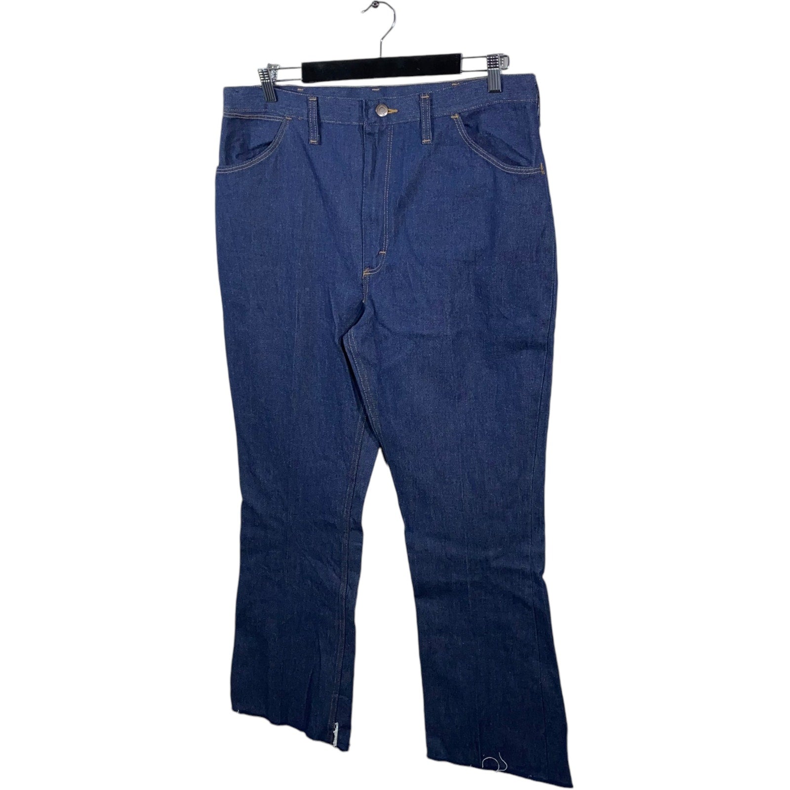 Collection of Wrangler Regular Fit Flared Denim Jeans 38 x 33 in a gallery layout