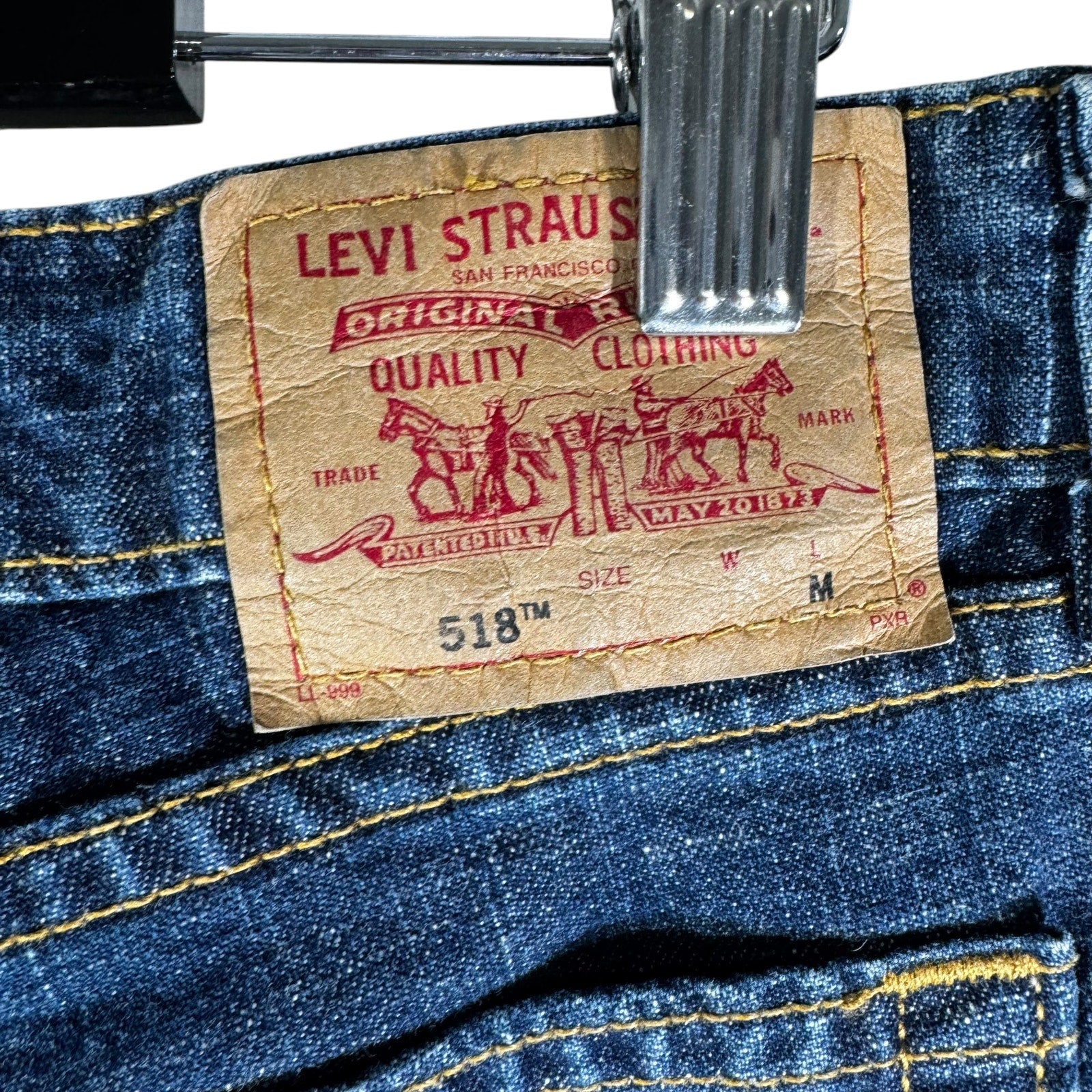 Collection of Levi Strauss Denim Flared Jeans 34x30.5 in a gallery layout