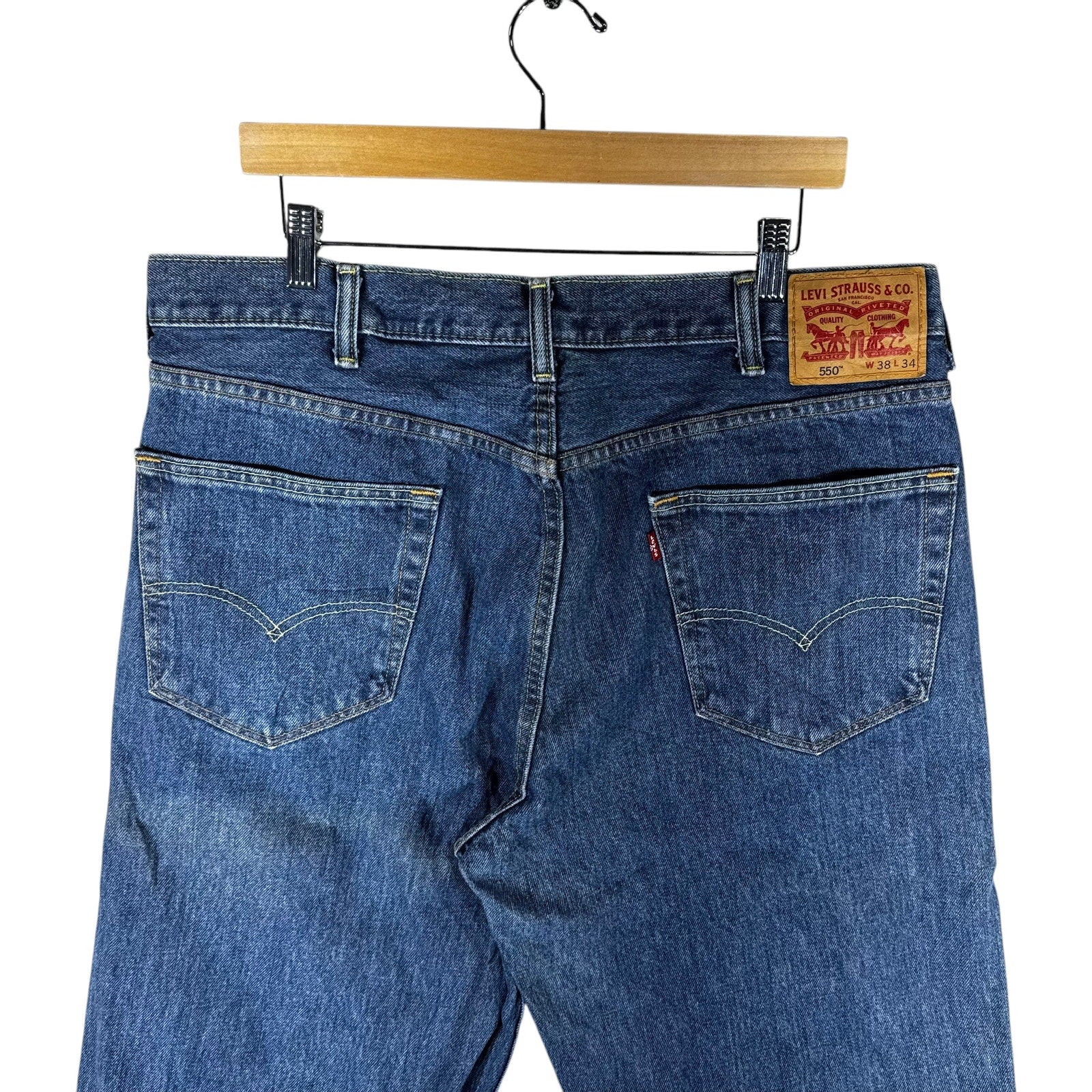 Collection of Levi's Straight Leg Denim Jeans 38 x 32 in a gallery layout