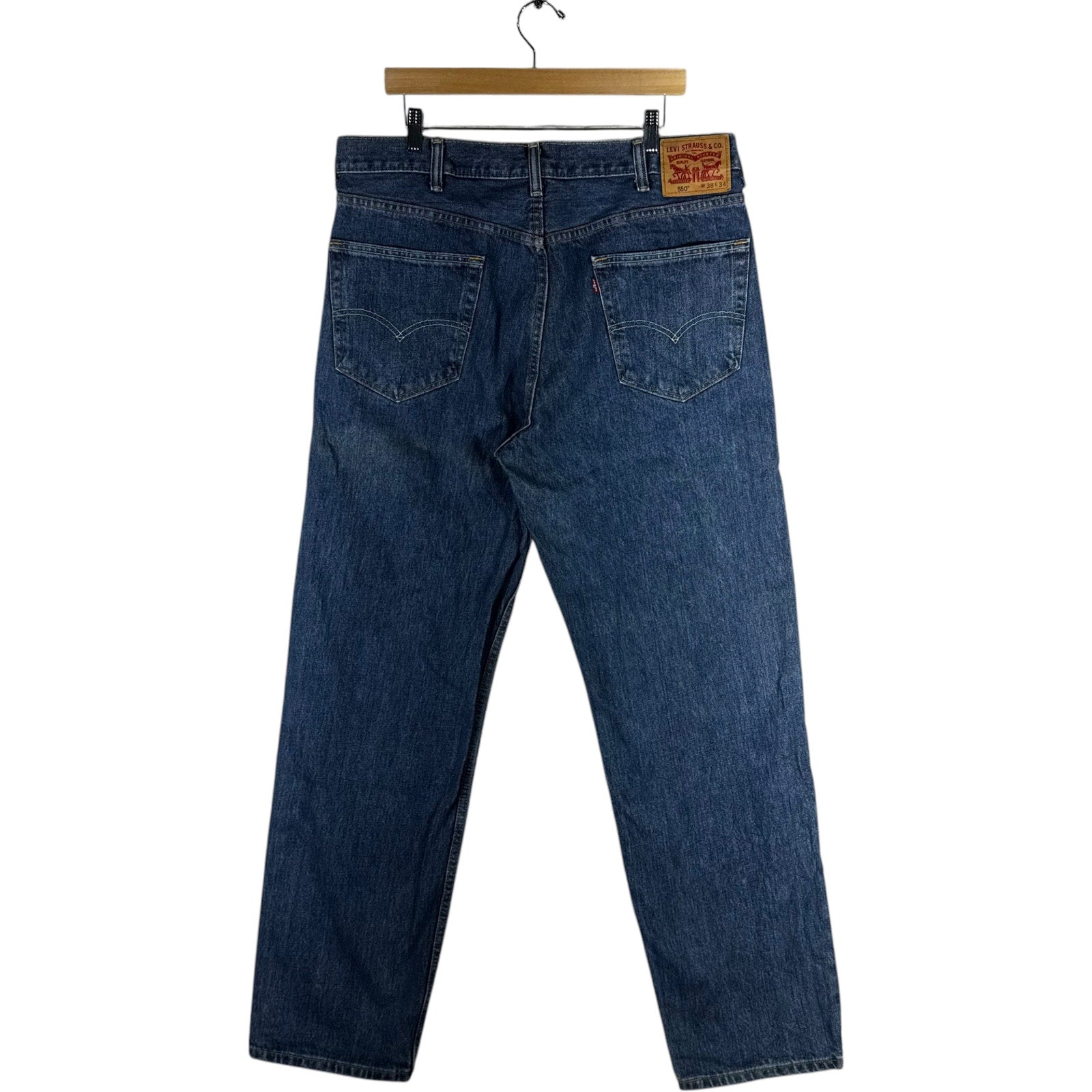 Collection of Levi's Straight Leg Denim Jeans 38 x 32 in a gallery layout