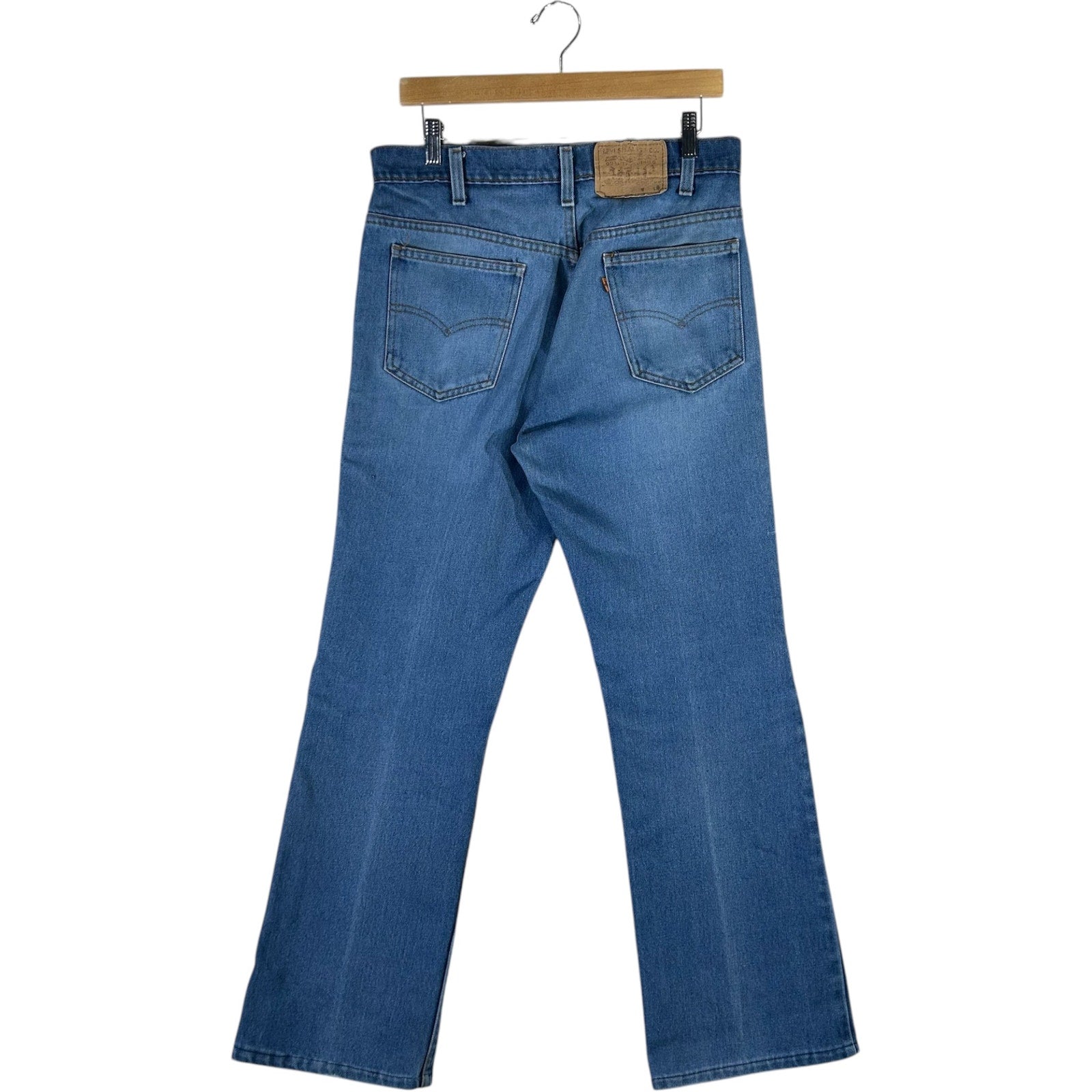 Collection of Levi's Orange Tab Boot Cut Jeans 33x29 in a gallery layout