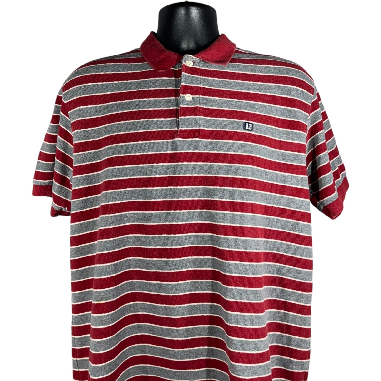 Collection of American Eagle Outfitters Striped Short Sleeve Polo in a gallery layout