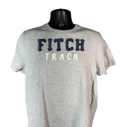 Collection of Abercrombie & Fitch "Fitch Track" Patch Spellout Muscle Tee in a gallery layout