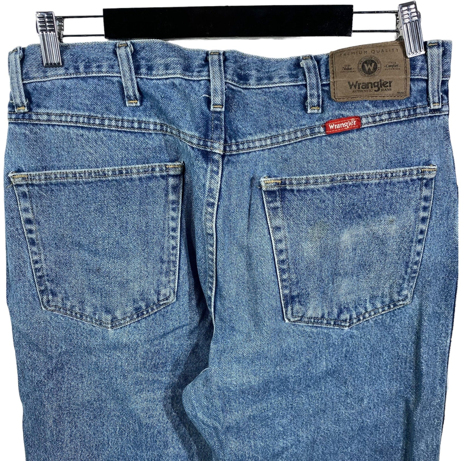 Collection of Wrangler Denim Straight Leg Jeans 34x34 in a gallery layout