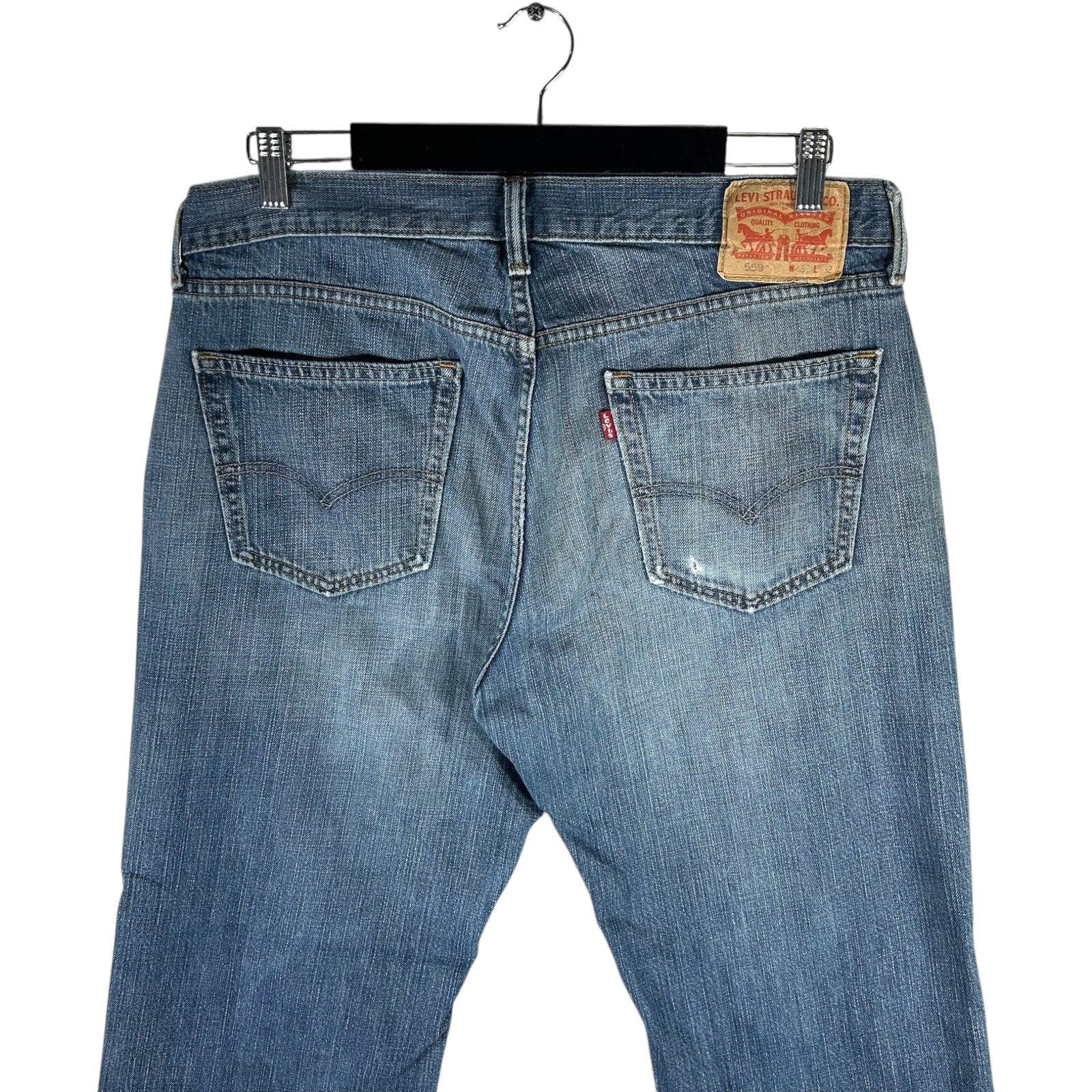 Collection of Levi's 559 Denim Straight Leg Jeans 34x30 in a gallery layout