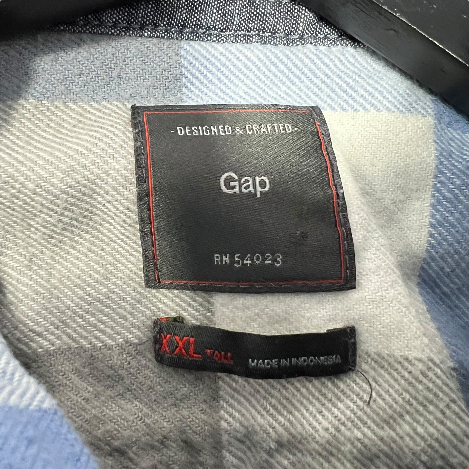 Collection of Gap Plaid Button Up Flannel in a gallery layout