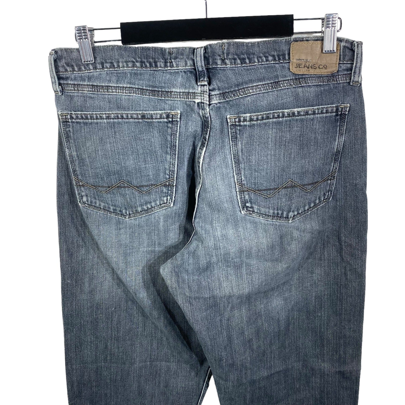 Collection of Wrangler Denim Straight Leg Jeans 32x32 in a gallery layout